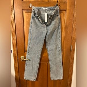 Never worn Cloud Ten High Rise Criss Cross Denim Jeans. Size Large.
